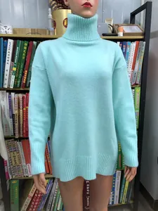 Mint green high turtleneck knitted sweater for women with soft texture shown on a mannequin