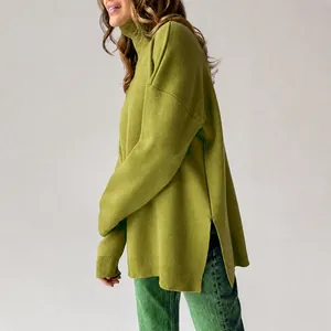 Detail of oversized olive green turtleneck sweater with side split design for women