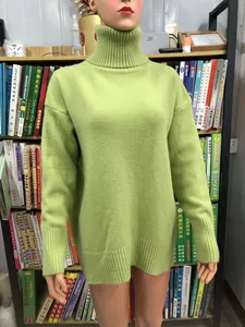 Soft lime green high turtleneck knit sweater featuring a cozy oversized silhouette