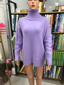Elegant soft purple high turtleneck knit pullover sweater displayed on a shop mannequin