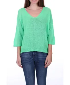Professional studio shot of a loose mint green V-neck knitted sweater with 3/4 sleeves