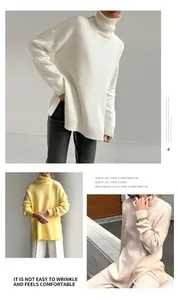 Detail view of loose-fitting turtleneck knit sweater with side slit and rib details