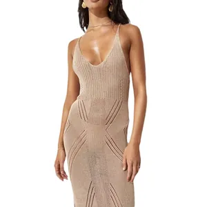 Elegant beige knitted beach maxi dress with V-neck and crochet geometric details