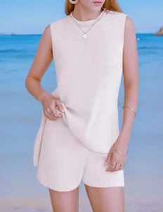 Detailed view of women's cream knitted two-piece beach set featuring a sleeveless vest