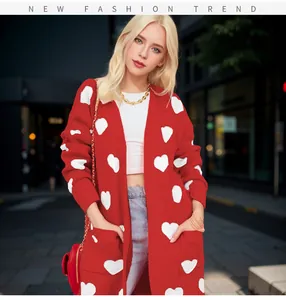Red women's knitted cardigan with white heart patterns and loose fit