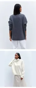 Soft knit turtleneck sweaters in grey and off-white shown on model in studio setting