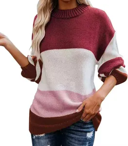 Close-up of color-block striped knit sweater in burgundy white and pink tones
