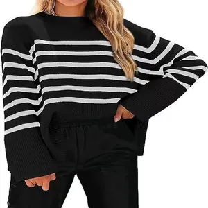 Detailed view of the soft knit texture on this oversized black and white striped sweater