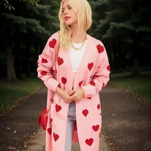 Stylish pink knit cardigan with red heart pattern and loose oversized fit for winter