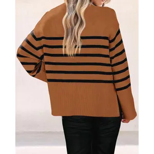 Back view of brown and black striped oversized knit sweater with wide sleeves.