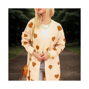 Oversized cream knitted cardigan with brown heart pattern for women's autumn style