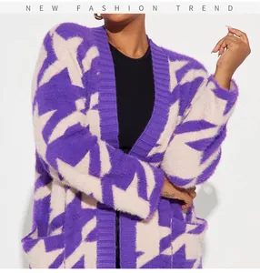 Close-up view of a stylish purple and white star patterned fuzzy knit cardigan sweater