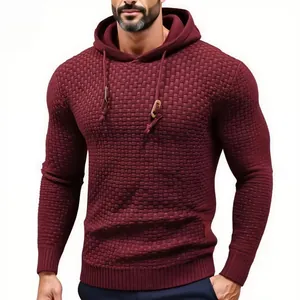 Close-up of a men's maroon knitted hoodie featuring a unique waffle texture and drawstrings