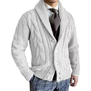 Close-up detail of a men's cable-knit cardigan showing intricate patterns and texture