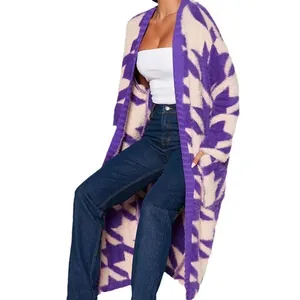 Close-up of long purple geometric pattern fuzzy knit cardigan with plush texture