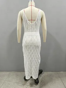 Detailed back view of a white sleeveless knit crochet beach dress on a studio mannequin