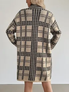 Back view of long knit cardigan with black and beige houndstooth plaid pattern