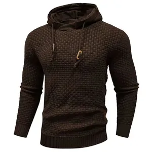 Detailed macro shot of men's textured waffle knit hooded sweater in dark brown color