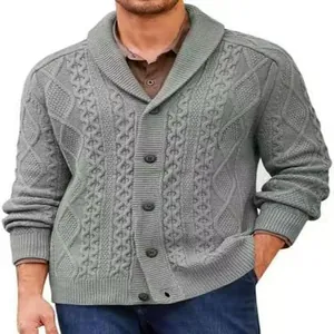 Macro detail of men's grey cable-knit cardigan with textured knit and dark buttons.