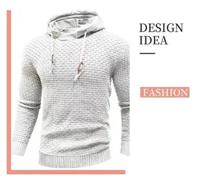 Detail of men's textured knit hoodie in light grey with adjustable drawstring hood.