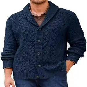 Detail view of men's navy blue cable-knit cardigan with shawl collar and buttons.