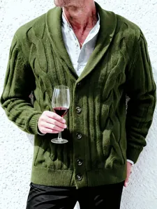 Detailed close-up of men's olive green cable knit shawl collar cardigan with buttons