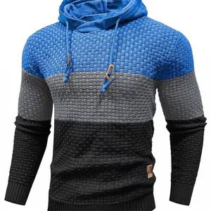 Detailed view of a textured color-block knit hoodie for men in blue, grey, and black colors
