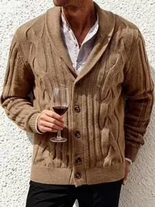 Detailed view of men's brown cable knit cardigan featuring shawl collar and button closure
