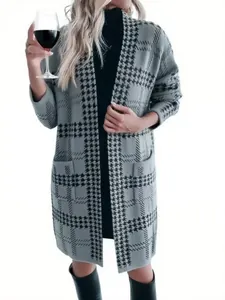 Elegant grey and black houndstooth long knitted cardigan shown on model with wine glass