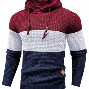 Detail of men's tricolor knitted hoodie featuring textured weave and drawstring.