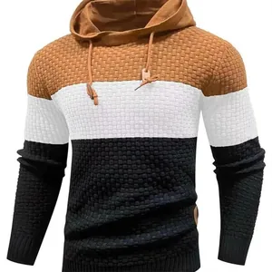 Detailed view of men's color-block hooded sweater featuring a textured waffle knit weave
