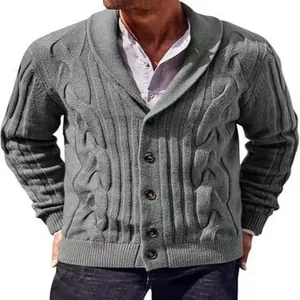 Detailed view of men's gray cable knit cardigan featuring a shawl collar and buttons