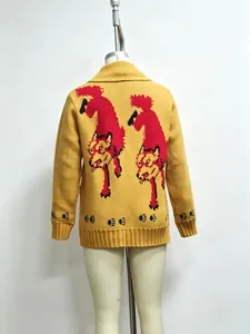Detail of retro yellow cardigan featuring unique red double wolf jacquard pattern.