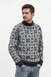Vue détaillée d'un pull jacquard rétro pour homme avec motifs géométriques et finitions