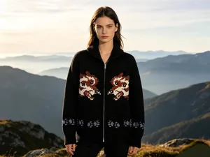 Vintage black knit cardigan featuring a double wolf jacquard pattern and front zipper closure