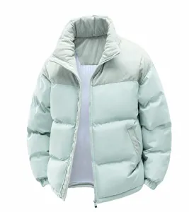 Detailed view of a mint green thickened puffer jacket with corduroy collar accents