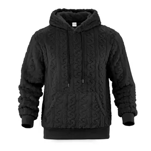 Detailed view of a men's black fleece hoodie with cable-knit texture and kangaroo pocket