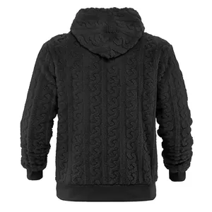 Back view of men's black cable-knit fleece hoodie showing plush thermal texture.