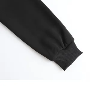 Detailed close-up showing the ribbed cuff of a high-quality black heated fleece hoodie