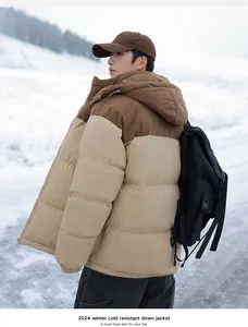 Side view of a thick color-block winter down jacket with corduroy hood detailing.