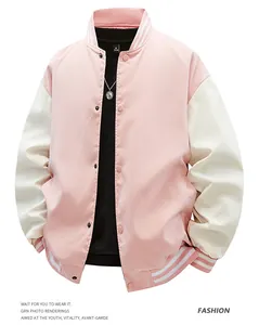 Close-up view of a pink and white American style varsity jacket featuring a baseball collar