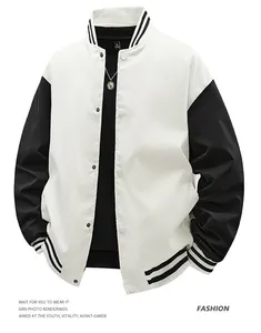 Detail view of a white and black American style baseball jacket with ribbed cuffs