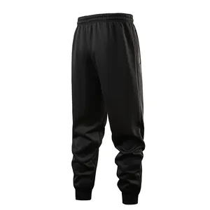 A back view showing the texture of men's black fleece joggers with elastic waist