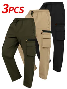 Detailed view of three-piece multi-pocket cargo pants in green, khaki, and black