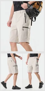 Vista dettagliata dei pantaloncini cargo kaki da uomo ad asciugatura rapida con tasche.