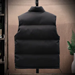 Back view of a premium men's black oversized puffer vest for winter street fashion