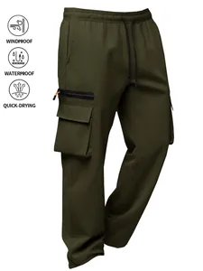 Close-up of olive green cargo pants with windproof, waterproof, and quick-dry icons