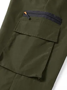 Detail view of olive green cargo pants featuring a large flap pocket and black zipper