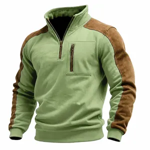 Detail view of green and brown contrast suede sweatshirt with half-zip stand collar and pocket