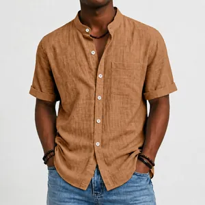 Close-up of a brown linen shirt with band collar and chest pocket details